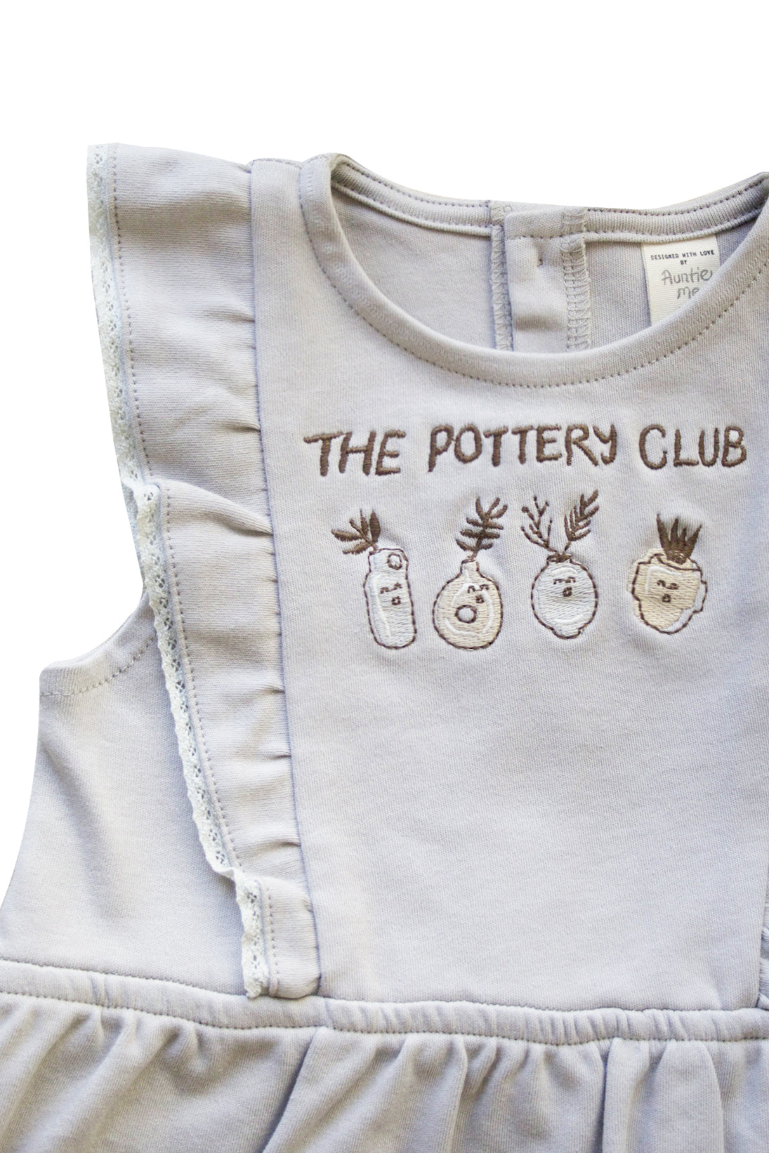 Organic Wind Chime ’The Pottery Club’ Bubble Onesie