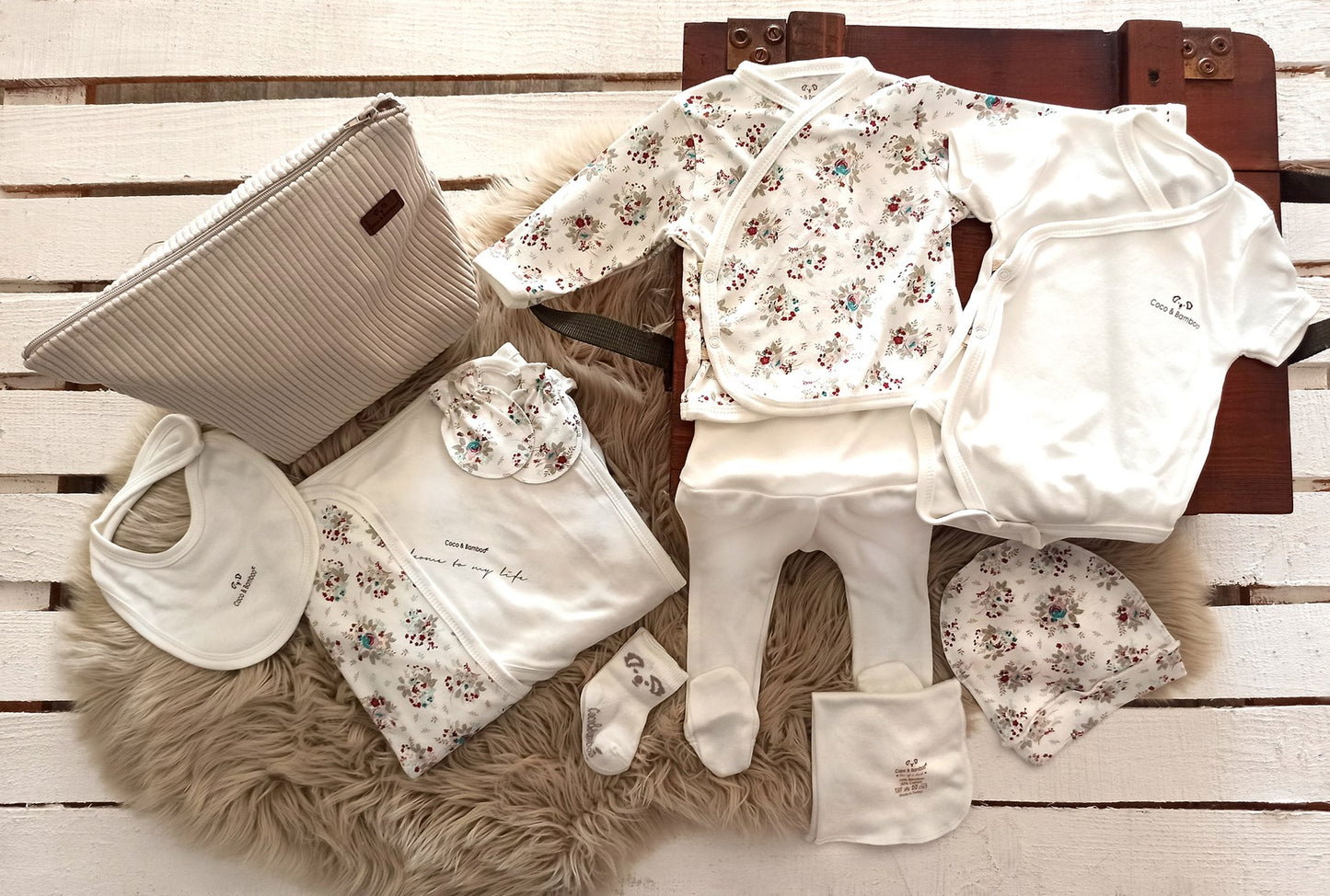 10 Pcs Newborn bamboo cotton set includes Booted bottom, cruise, body, hat, bib, gloves, hand-towel, socks, blanket and Special bag.