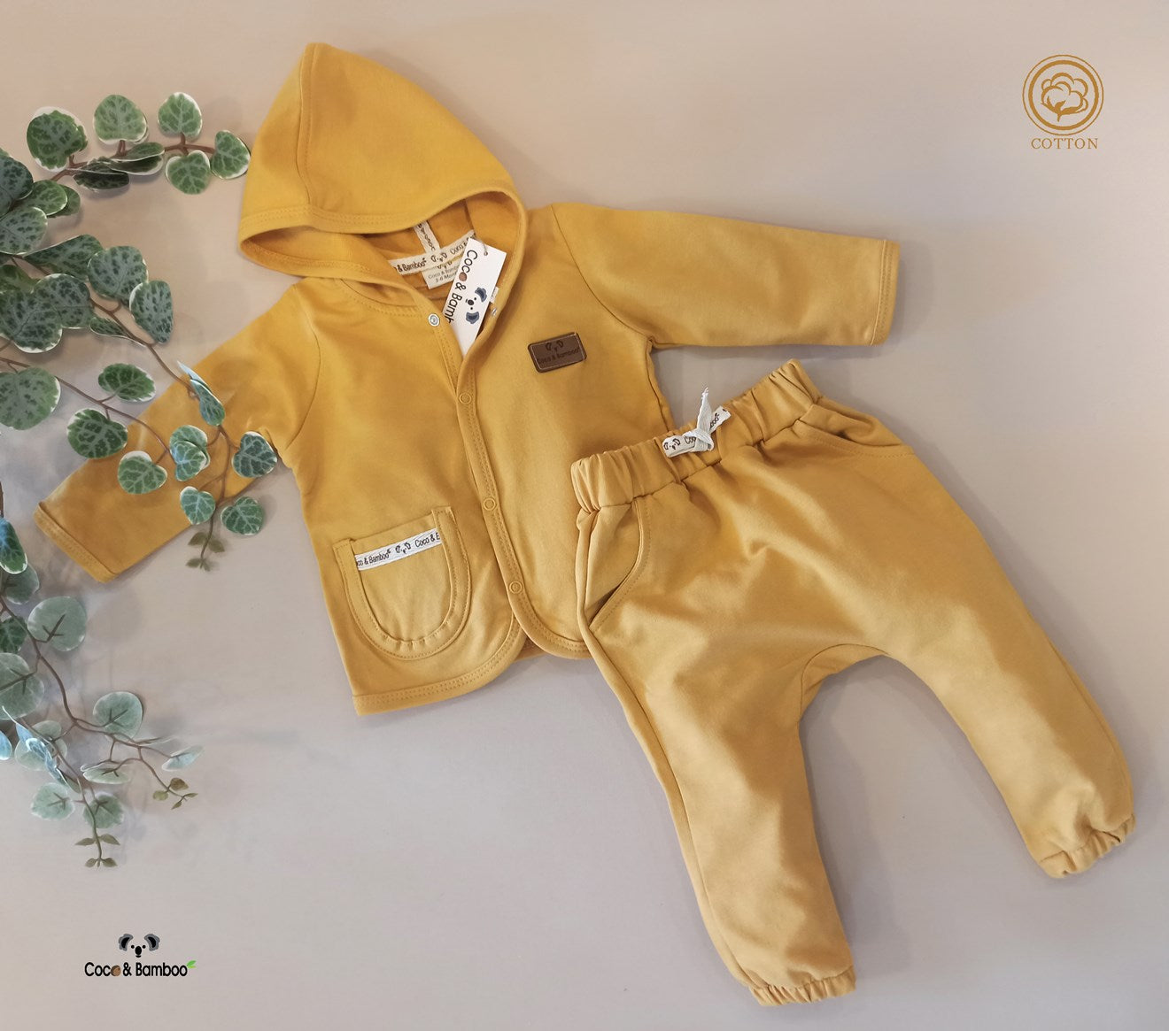 Hooded long sleeve Baby Set made of 100% Cotton.  includes jacket and pants.