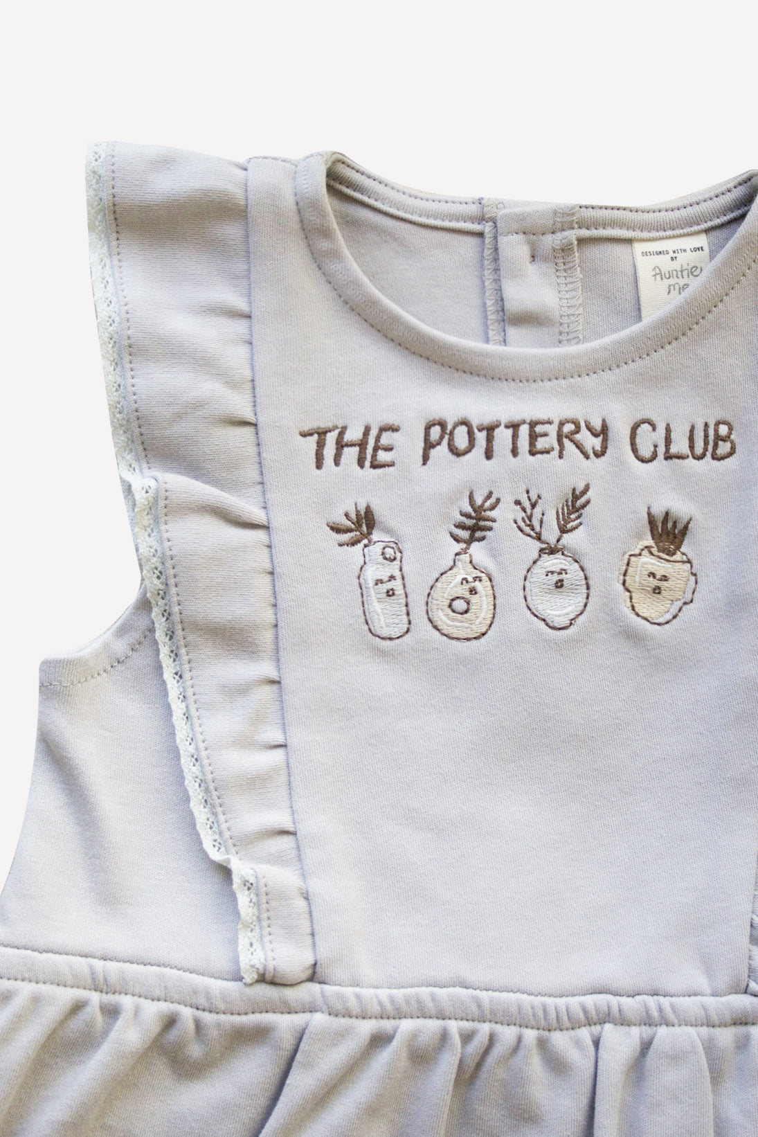 Organic Wind Chime ’The Pottery Club’ Bubble Onesie